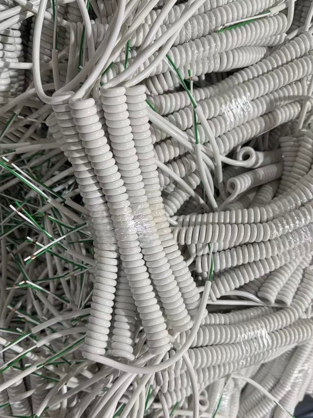 Coiled security cord option for a high-speed hotel hair dryer