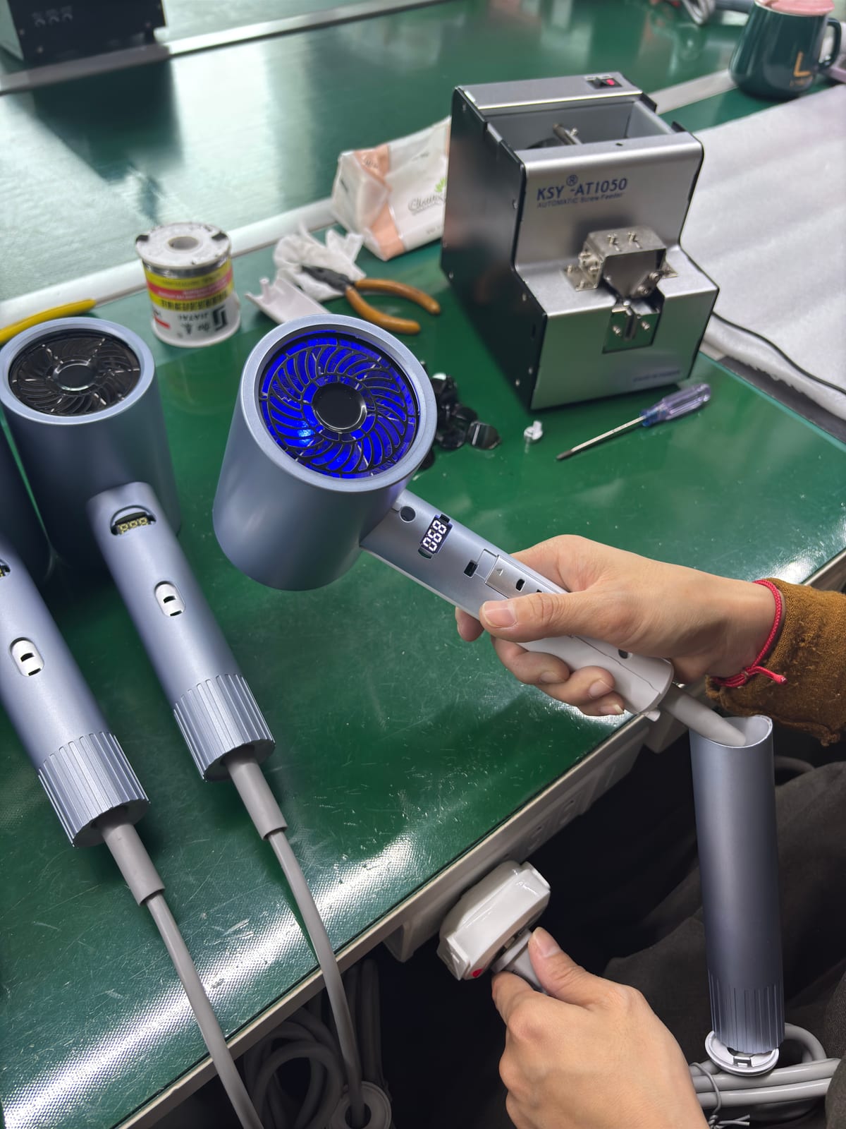 Hotel hair dryer power-on testing during production
