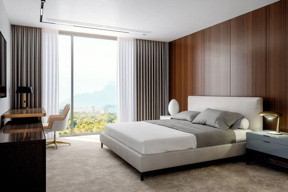 Modern hotel guest room with bed and window